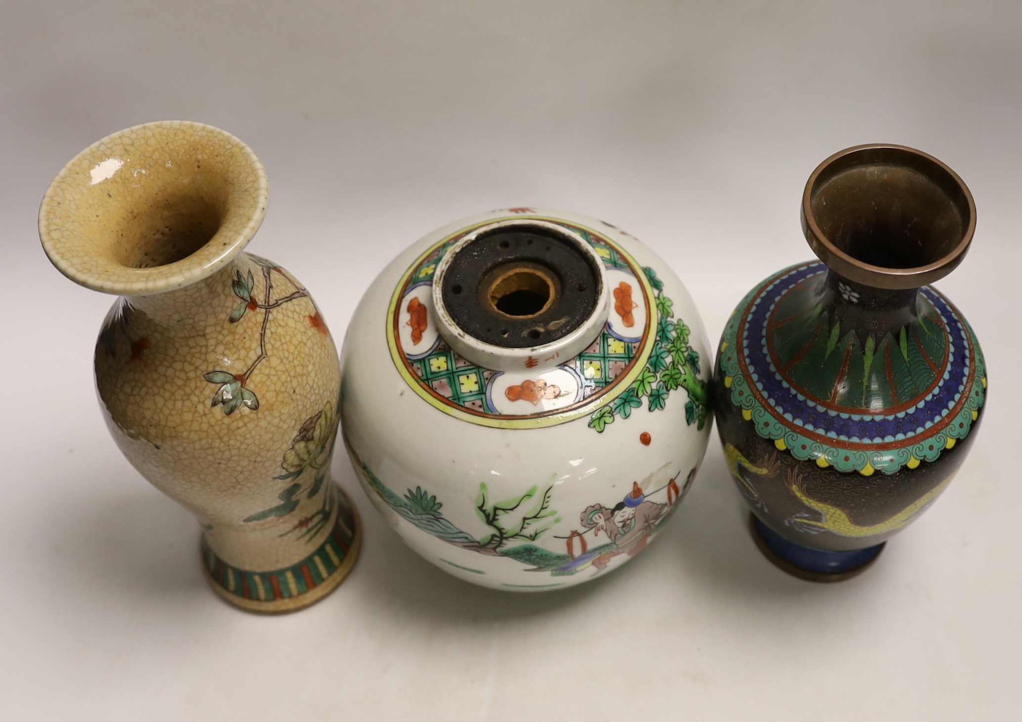 A Chinese famille verte crackle glaze vase, a jar, a cloisonné enamel dragon vase, another enamelled jar and cover and a soapstone vase, largest 25cm high